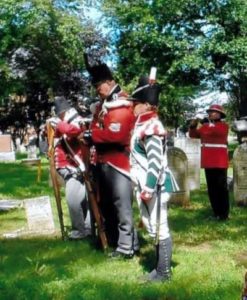 Bugler Cpl. Mike Barry and 2nd Lincoln Militia Re-enactors at the Graveside Recognition Ceremony of Private Richard London