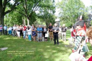 Rev'd Bahman Kalantari gives the opening prayer for the gathering at the War of 1812 Graveside Recognition Ceremony.